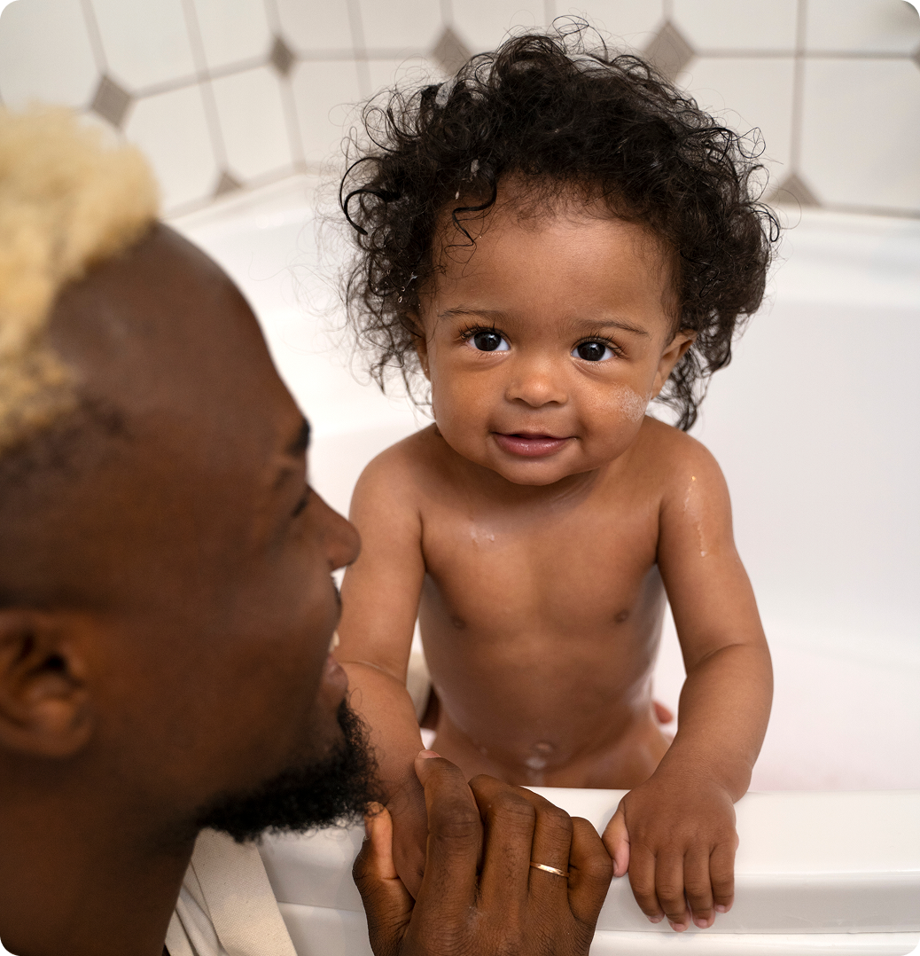 Baby receiving gentle care during bath time